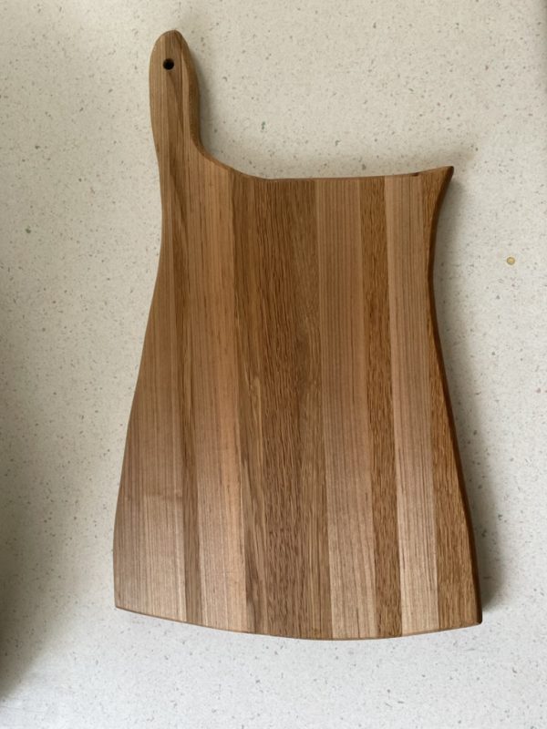Handled cutting board